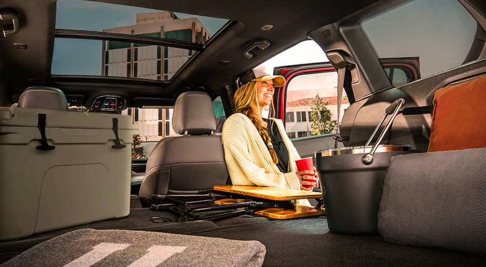 Woman sitting in the back row of a 2026 Jeep Cherokee