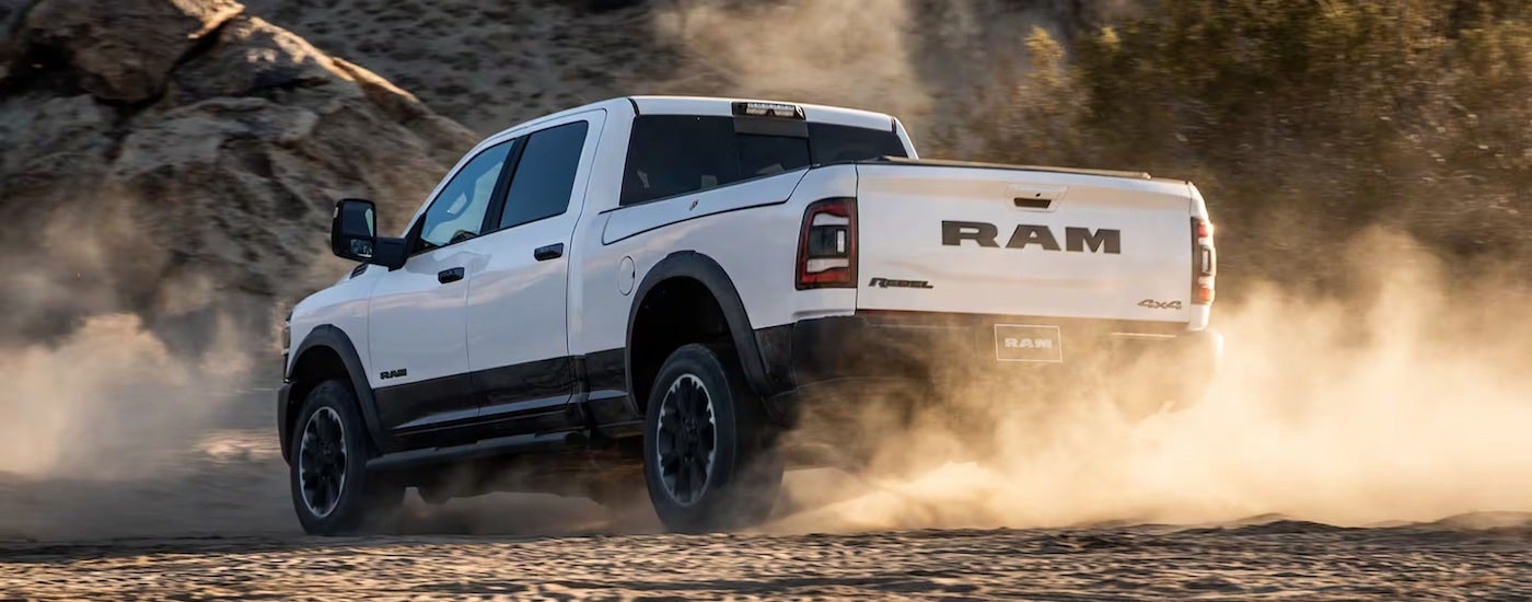A white 2025 Ram 2500 from the rear.