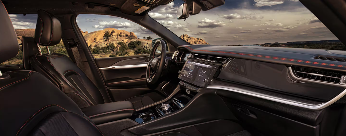 Black interior of a 2026 Jeep Cherokee from the passenger seat