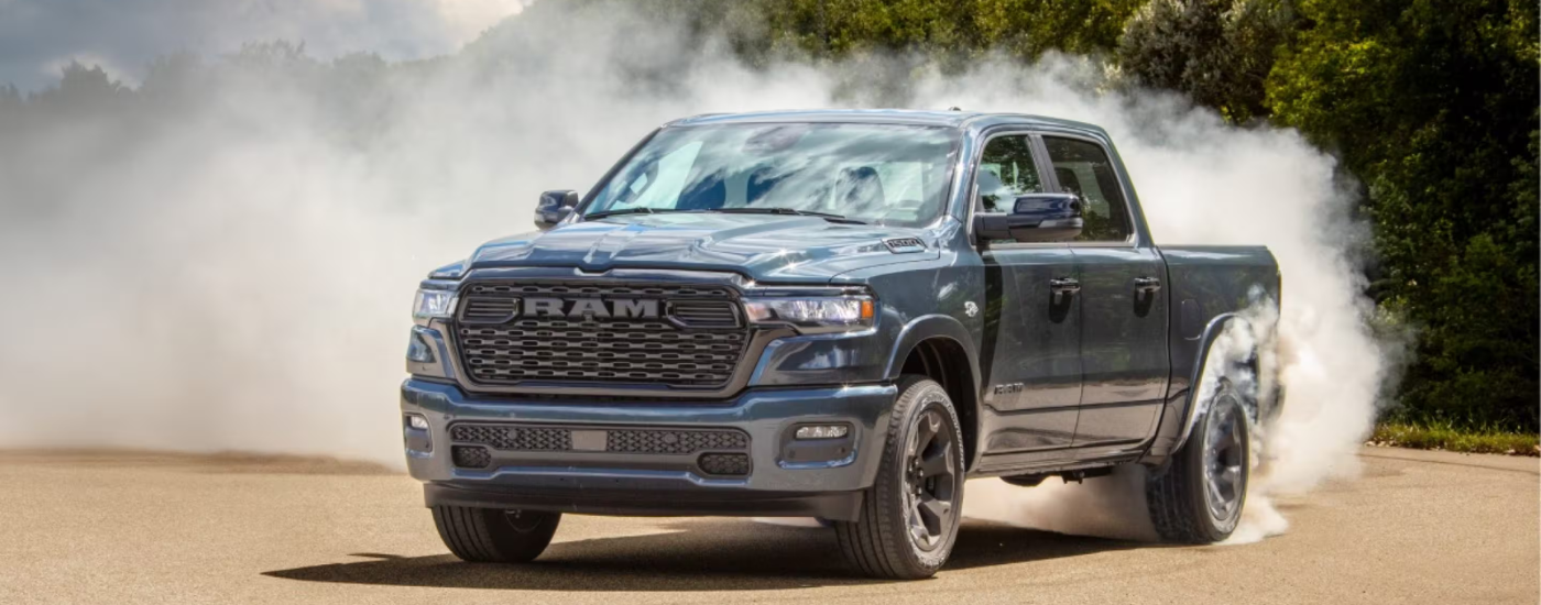 Blue 2026 Ram 1500 during a burnout